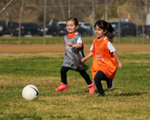 Two Girls Running